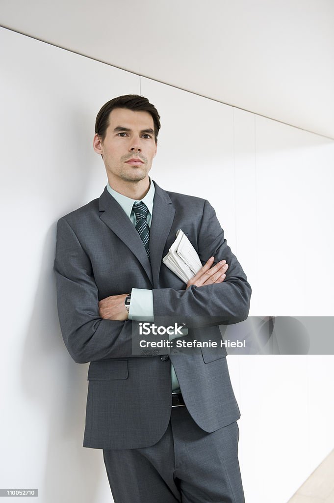 Man waiting with newspaper  30-34 Years Stock Photo