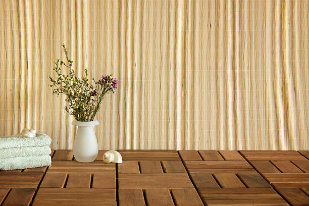istock Beauty Treatment: Towels, Vase and shell on wooden floor 110701648