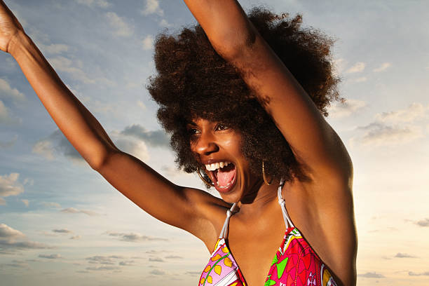 istock Young woman dancing in joy 110826982
