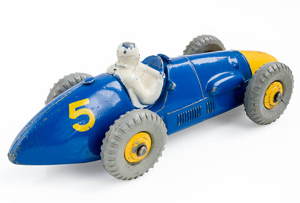 istock Vintage toy racecar on white 110853802