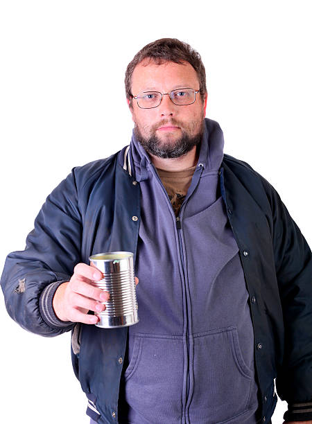 man with tin can stock photo