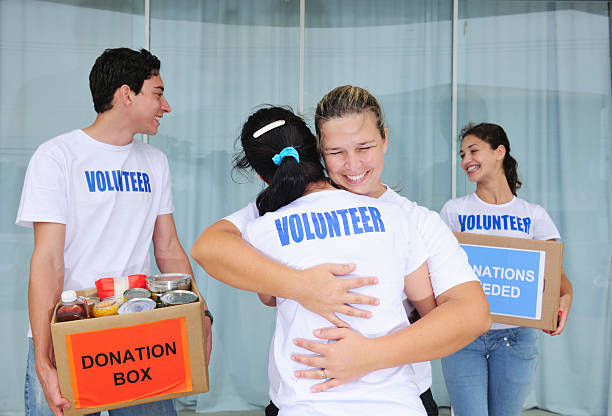 istock happy volunteer group with food donation 110862933