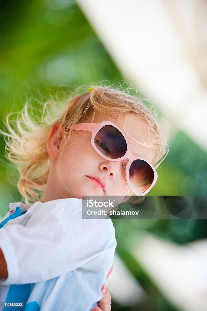 Toddler girl in sun glasses  Beautiful People Stock Photo