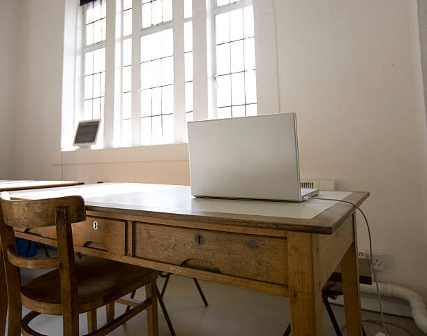 istock laptop on wooden table 110886861