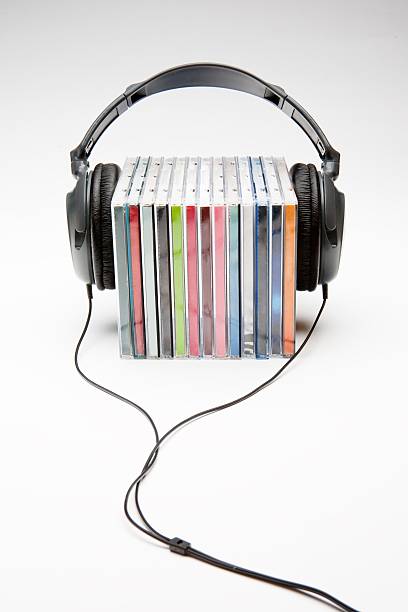 headphones on cd's stock photo