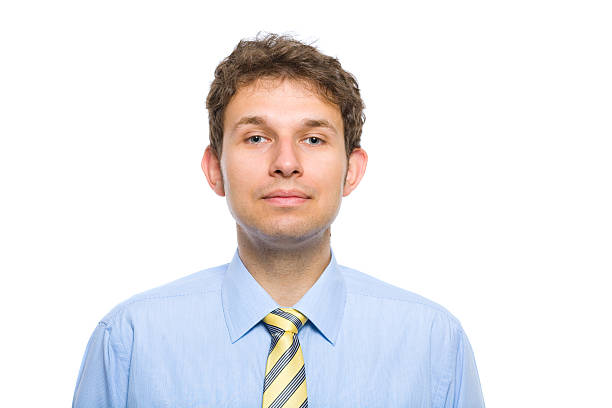 istock young bisinessman, blue and yellow, isolated 110894544