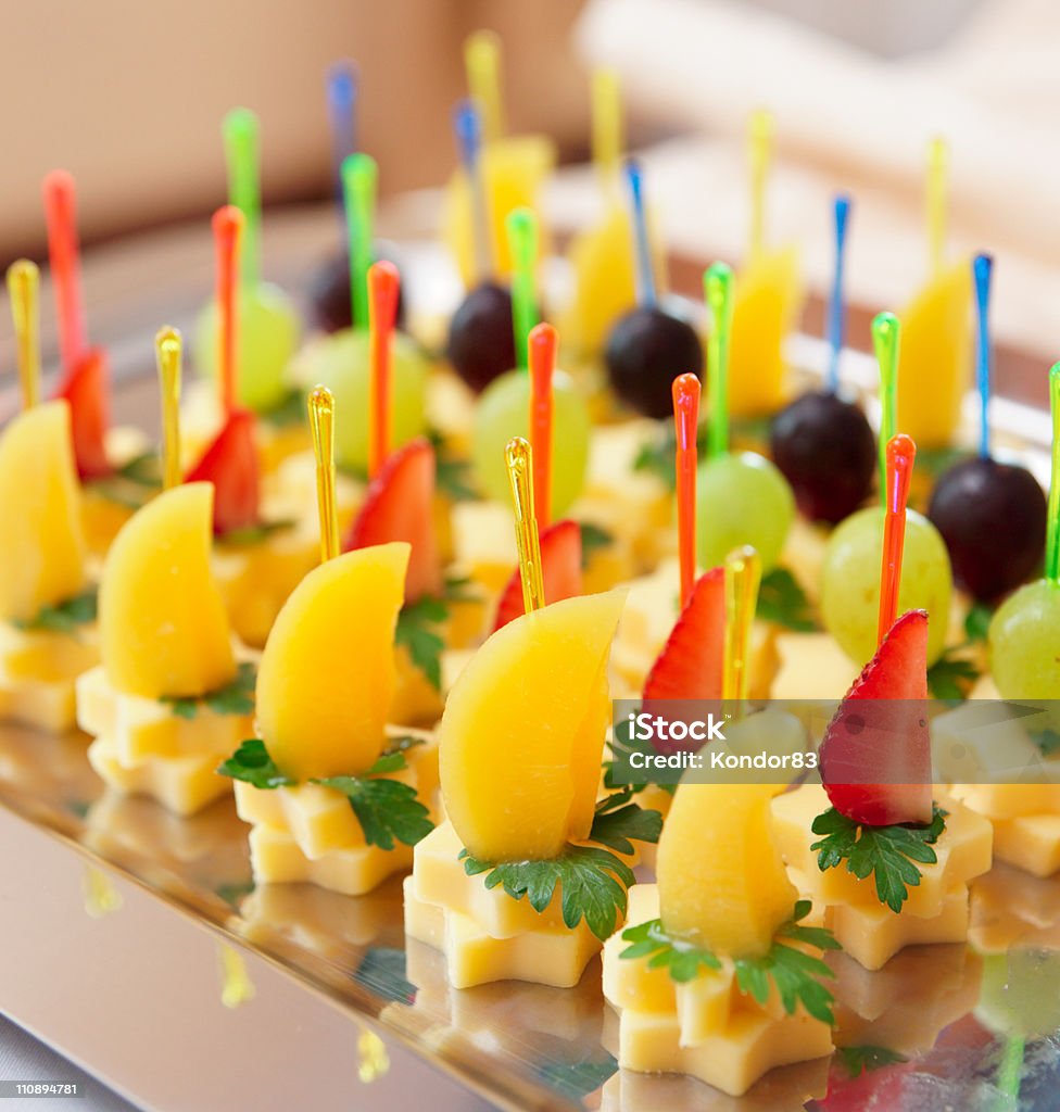 Canapes of cheese with fruits Canapes of cheese with fruits, close-up shot Arrangement Stock Photo