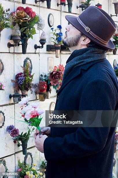 Adult Man At Cemetery Stock Photo - Download Image Now - Adult, Adults Only, Catacomb