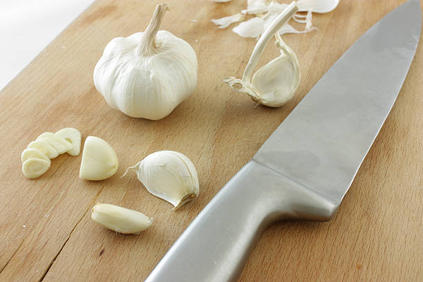 istock Garlic on a Cutting Board and Knife 110897767