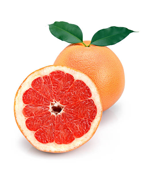 istock Grapefruit fruits with cuts and green leaf isolated 110898824