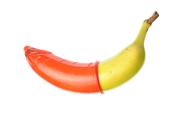 Condom on banana stock photo