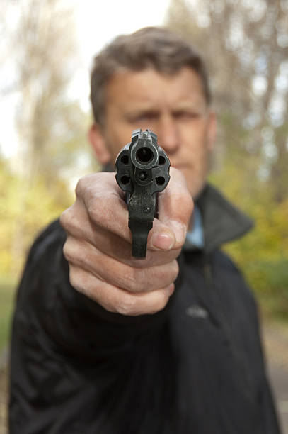 istock The man aims from revolver 110904355