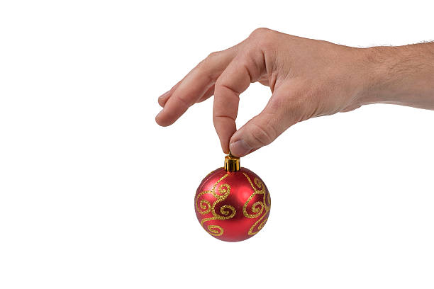 istock Christmas ball hold by human hand 110904605