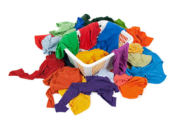 istock Bright messy clothes in a laundry basket 110916038