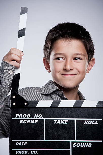 istock Child with movie clapper board. 110916101