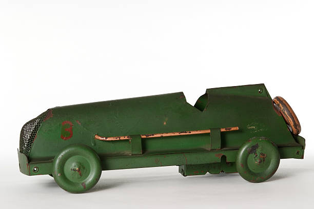 istock Vintage tin toy racing car isolated on white background 110918331