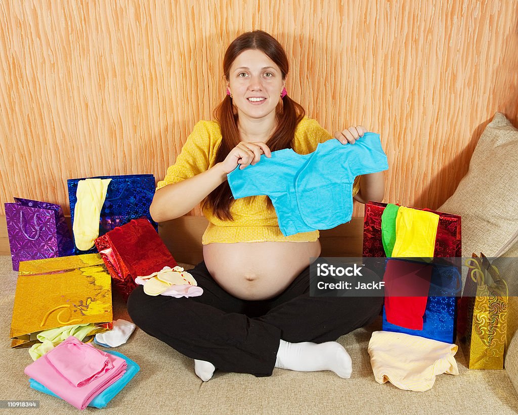 pregnant woman with purchases  Holding Stock Photo