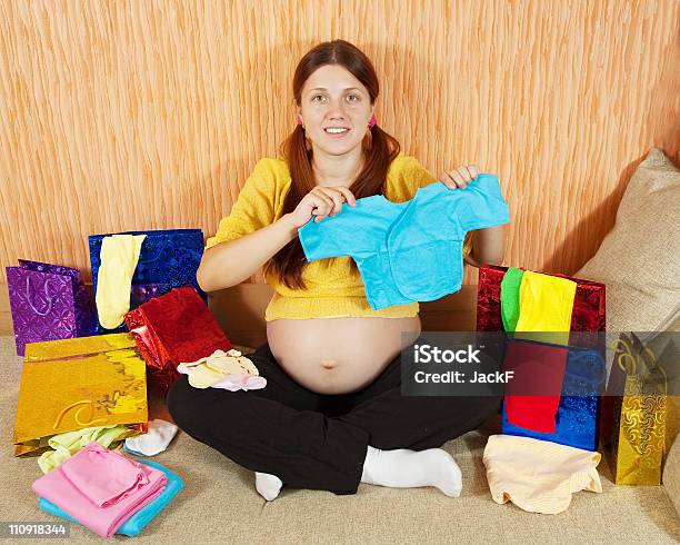 Pregnant Woman With Purchases Stock Photo - Download Image Now - Holding, Infant Bodysuit, Mother