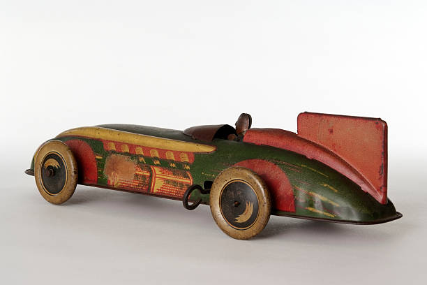 istock Vintage tin toy racing car isolated on white background 110918360