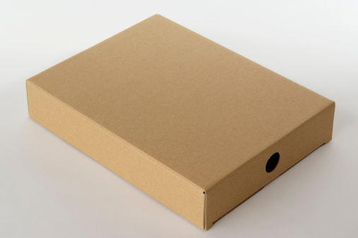 Blank cardboard box isolated on white background.