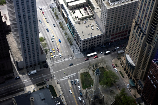 Looking Down At Downtown Intersection with Cars