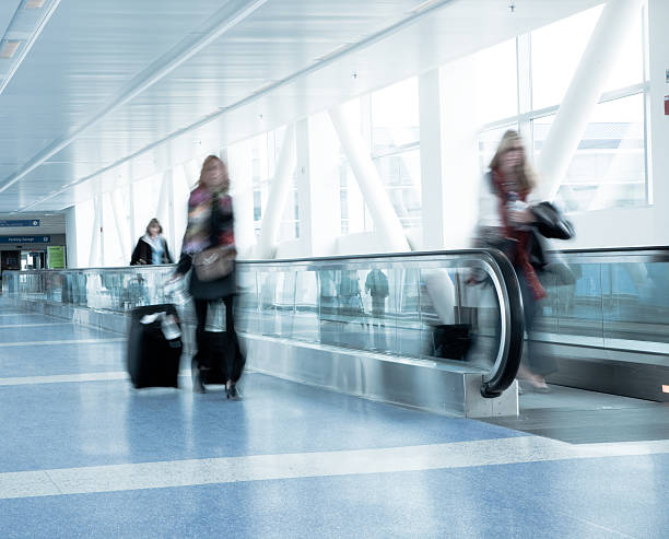 istock People in blurred motion at airport 110926137