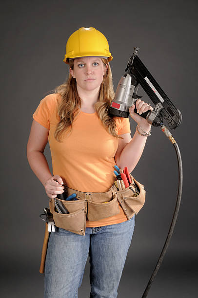 istock Female With Air Nailer 110928882