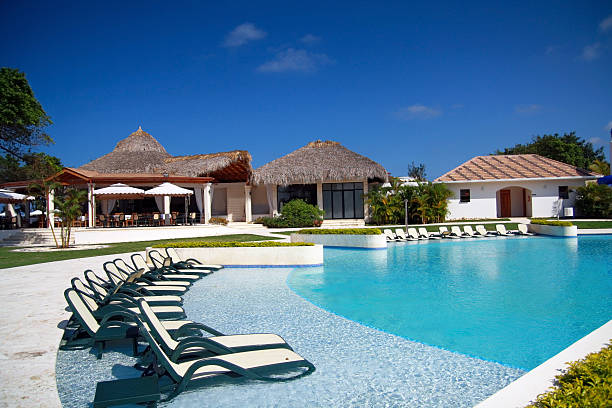 istock Chairs near swimming pool in residence 110930929