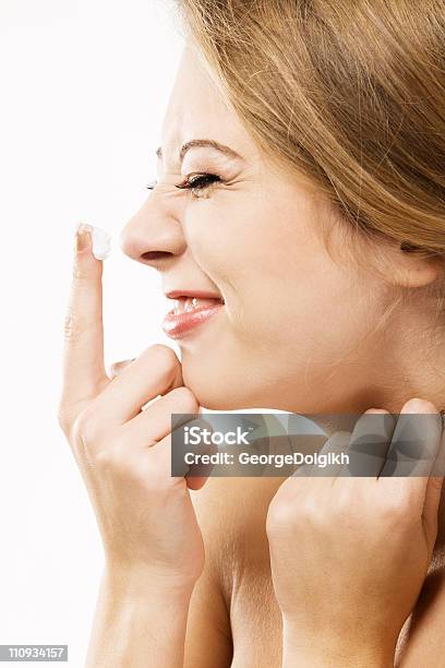 Cheerful Girl Apply Moisturize Cream Stock Photo - Download Image Now - Moisturizer, Adult, Adults Only