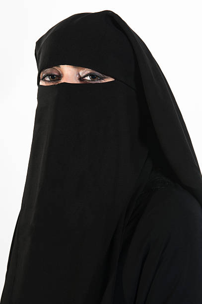 istock A middle eastern woman wearing a black burka 110934806
