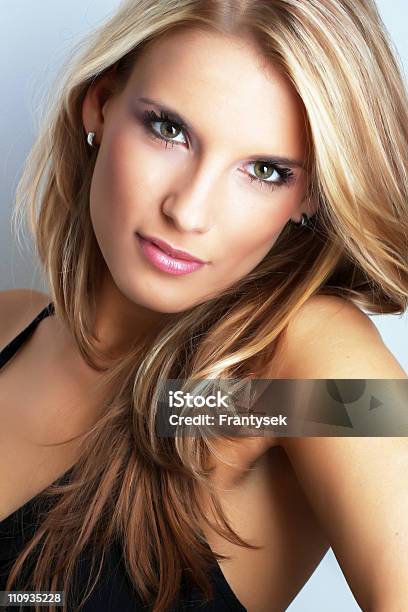 Close Up Of A Young Bond Woman In Black Top Stock Photo - Download Image Now - 20-29 Years, Adult, Adults Only