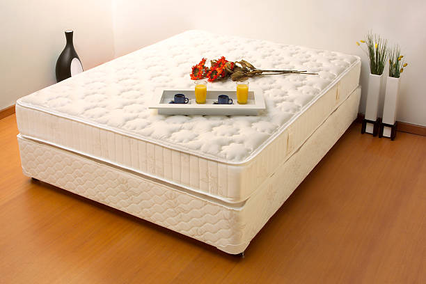 istock A bed mattress with flowers and welcome drinks  110938289