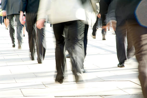 istock Crowd of commuters feet, movement blur 110942606