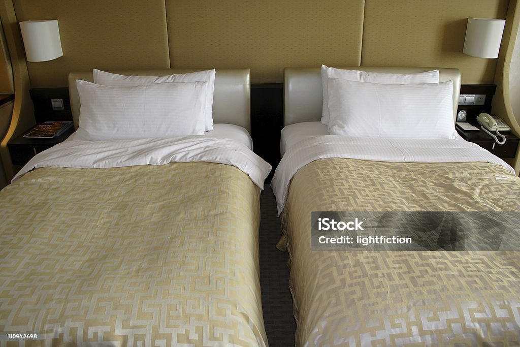 two beds Tidy Two beds in a 5 stars luxury hotel room.Room renting. Twin Bed Stock Photo