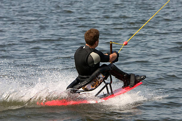 wakeboarder disabili - water ski foto e immagini stock