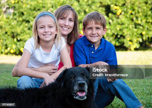 Family With Dog Stock Photo - Download Image Now - Child, Divorce, Mother