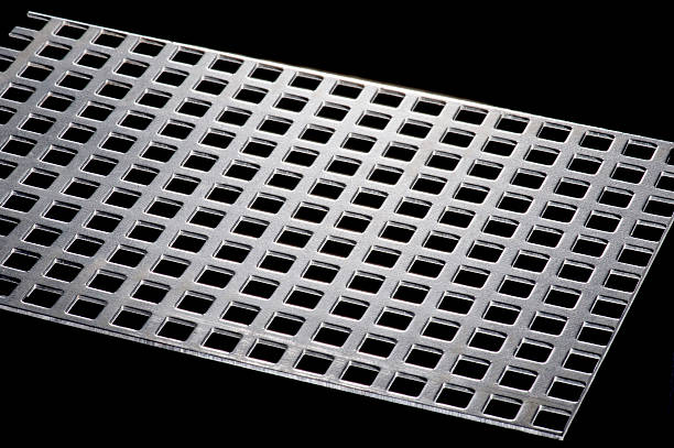 istock punched metal isolated on black 111778722