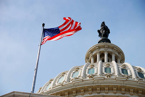 istock US Flag and Capitol building, Washington DC 111788526