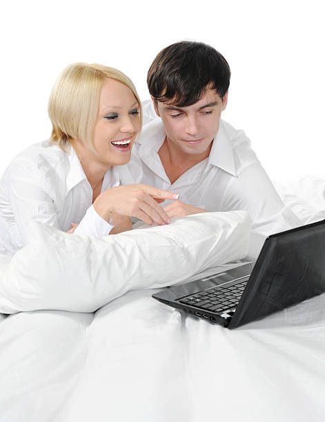 istock couple with laptop 111794651