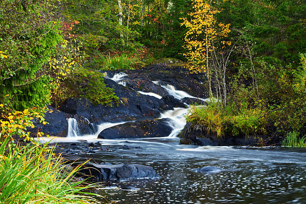 istock mountain waterfall. fast stream water. autumn landscape 111797699