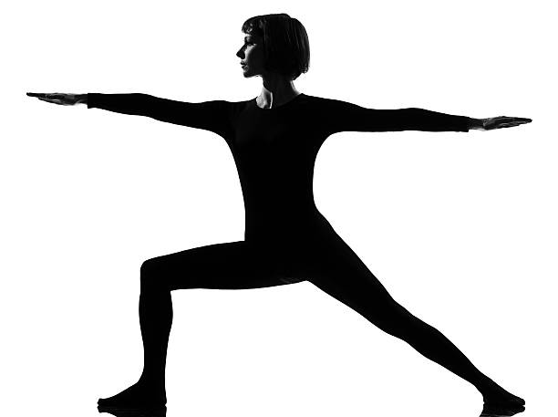istock virabhadrasana 2 warrior postion yoga woman 111801321