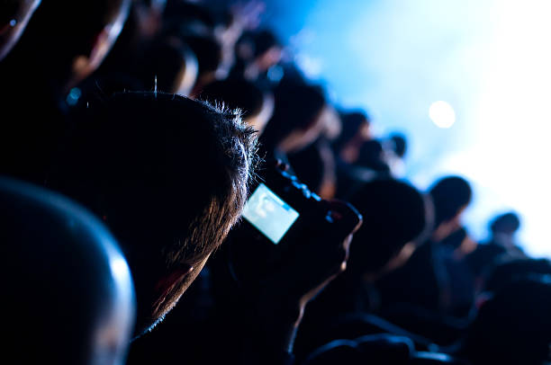 istock Man Taking Pictures At Rock Show 111806346