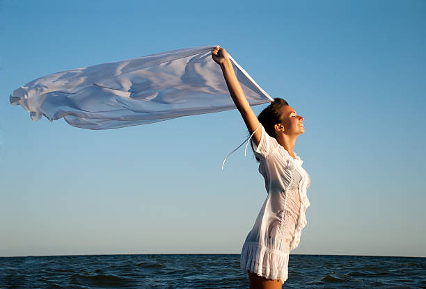 istock Girl with kerchief on the sunset. 111811034