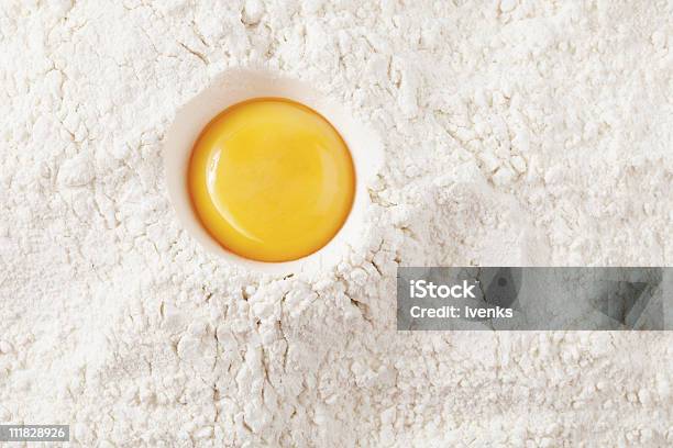 Love To Bake It Egg Yolk On Flour Full Frame Stock Photo - Download Image Now - Animal Egg, Bakery, Baking