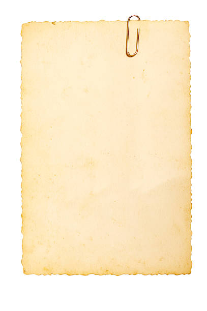 istock Aged discolored postcard with a paper clip attached 111829922