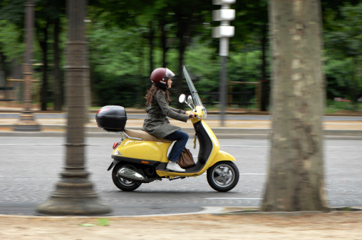 Female Scooter Rider in Paris France