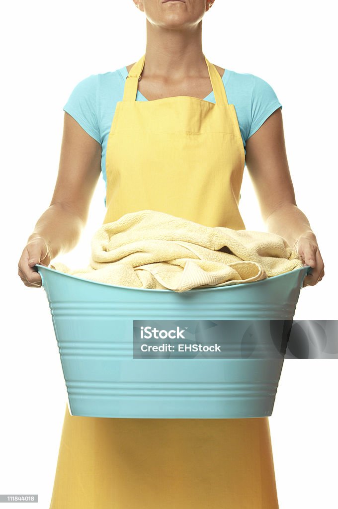 Housewife Maid Holding Laundry Basket Isolated on White Background A woman holding a basket of laundry against white  Laundry Basket Stock Photo