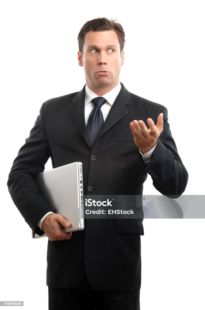 Confuso Uomo d'affari con Computer portatile isolato su sfondo bianco - Foto stock royalty-free di Affari