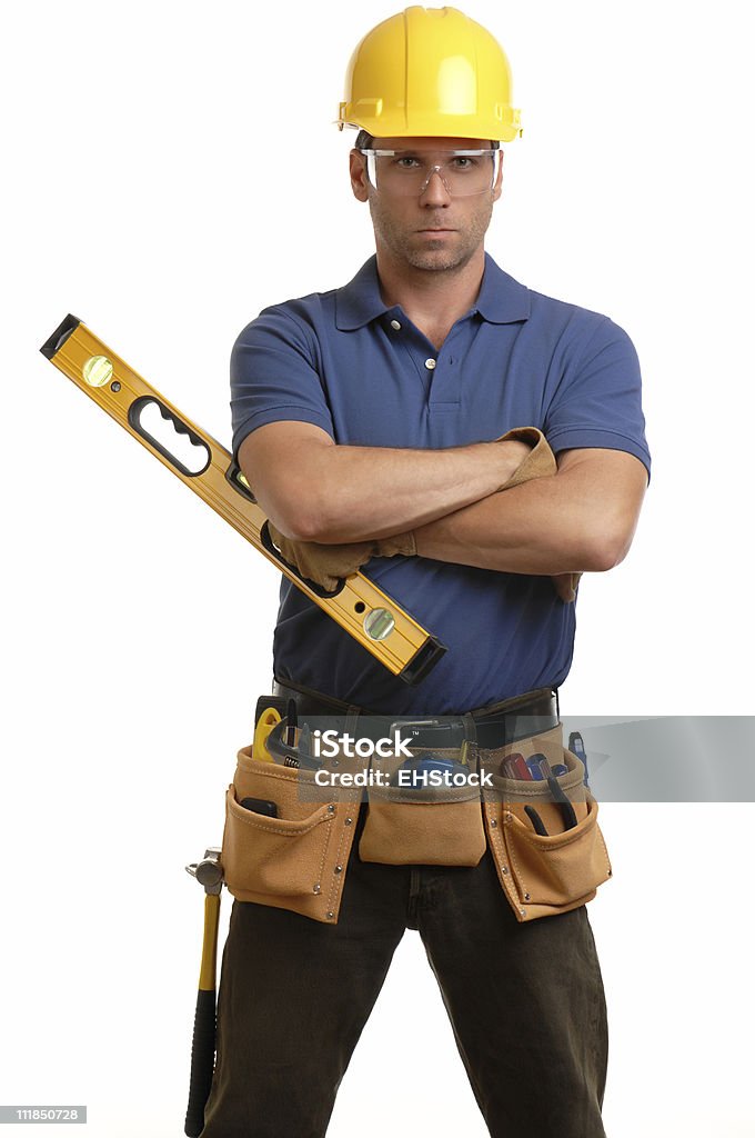 Empreiteiro carpinteiro construção Chapéu duro Toolbelt braços cruzados em branco - Royalty-free Adulto Foto de stock