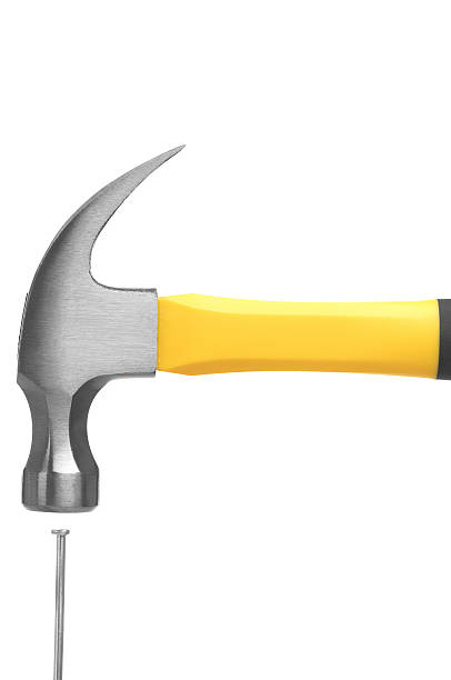 istock Hammer Driving Nail Isolated on White Background 111851603